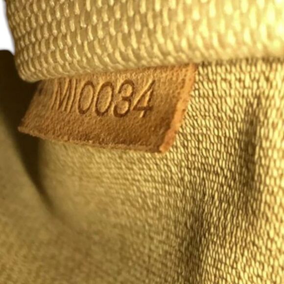 Louis Vuitton Monogram Ttouville Handbag - Picture 12 of 16